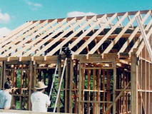 Finishing off the stud frame, onto which will be fixed insulation, exterior cladding, interior walls and roofing material