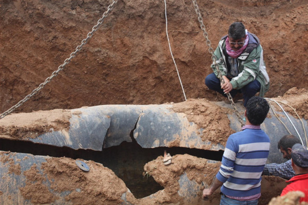 A damaged water supply system in Til Temir, 3 April 2020