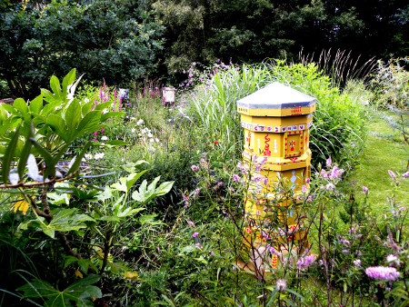 Decorated, bee-friendly hive.