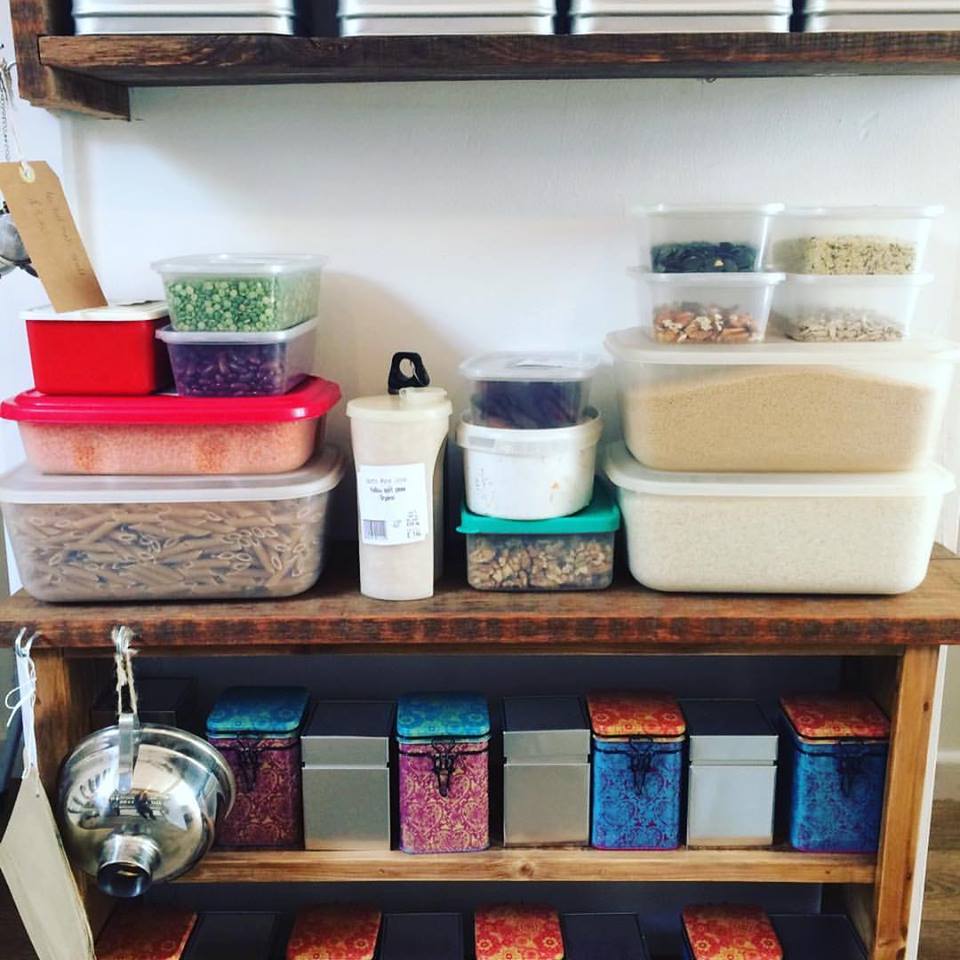 A variety of containers brought by customers to fill up with produce at the zero-waste shop