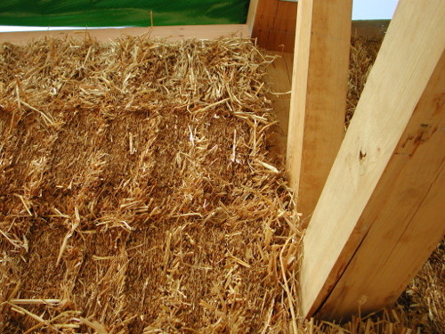 Straw bale with timber framing detail in our straw-bale building online course