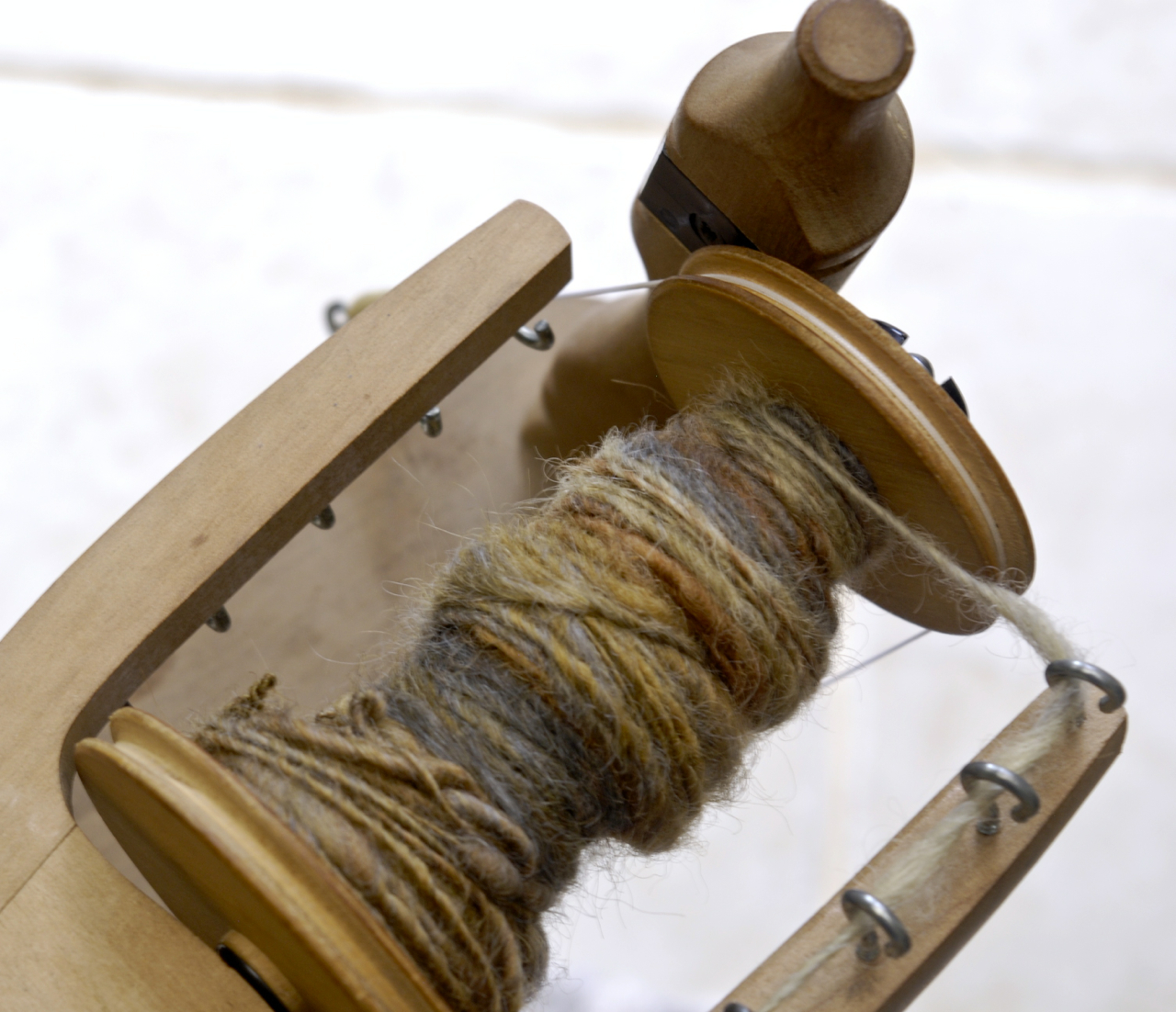 Spun yarn on a bobbin