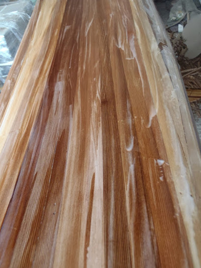 Building your own sea kayak: a bit of a mess with epoxy resin on the deck
