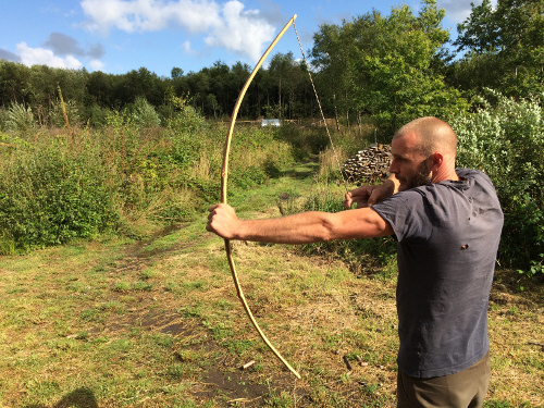 homemade wooden bow and arrow