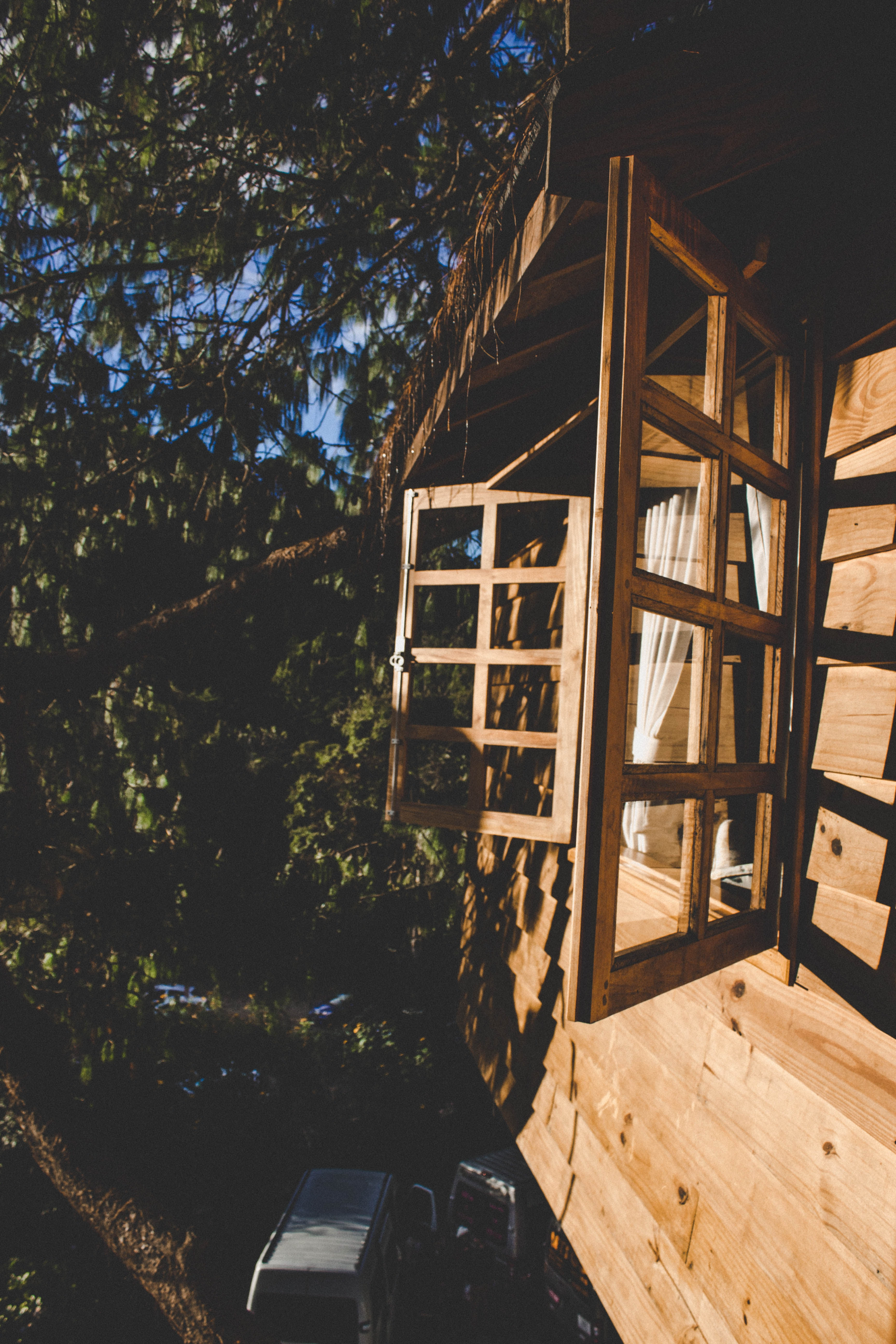 Open window of a timber tiny house by Angela Cavina from Pexels