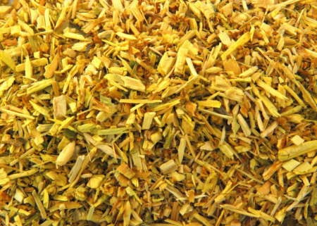Dried and chopped yellow coloured weld for use as a natural dye