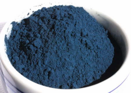 A deep blue powdered woad for use in dyeing