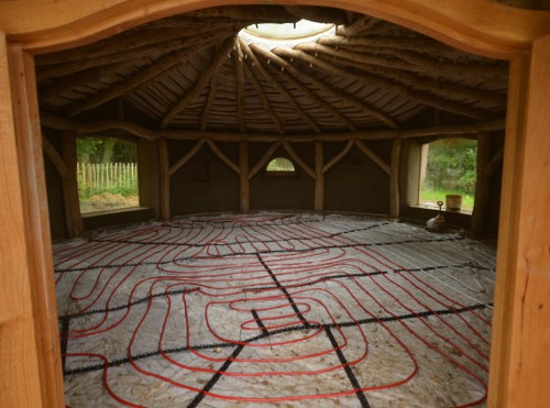 Underfloor heating is a great option for earthen floors