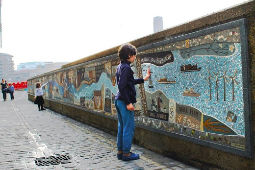 Giant outdoor mosaics on a wall