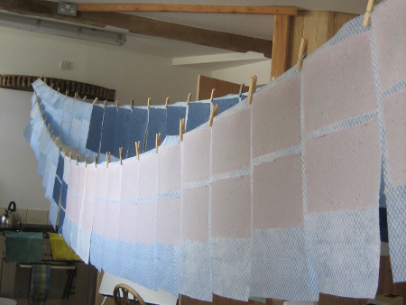 Process of making handmade paper from cotton rags and natural fibre.