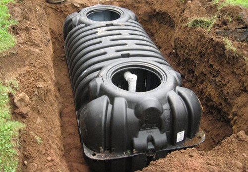 An off-the-shelf plastic septic tank