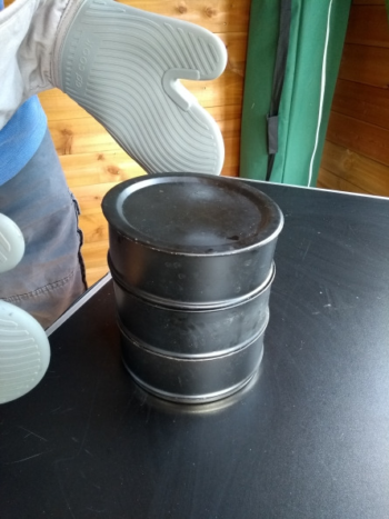 A three-tier tiffin is a useful vessel when using a solar slow cooker