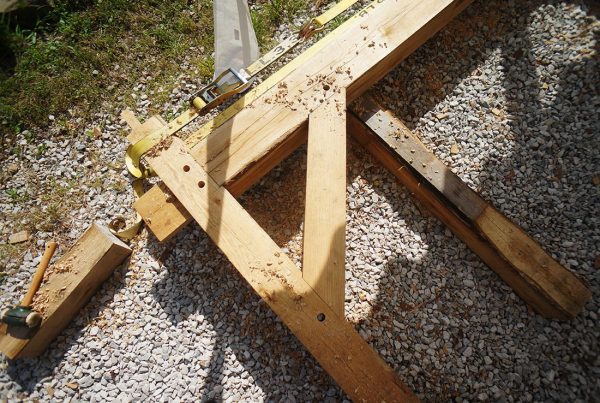 A timber frame ready for charring as part of preserving wood with fire